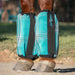 Aqua bubble fly boots on horse leg.
