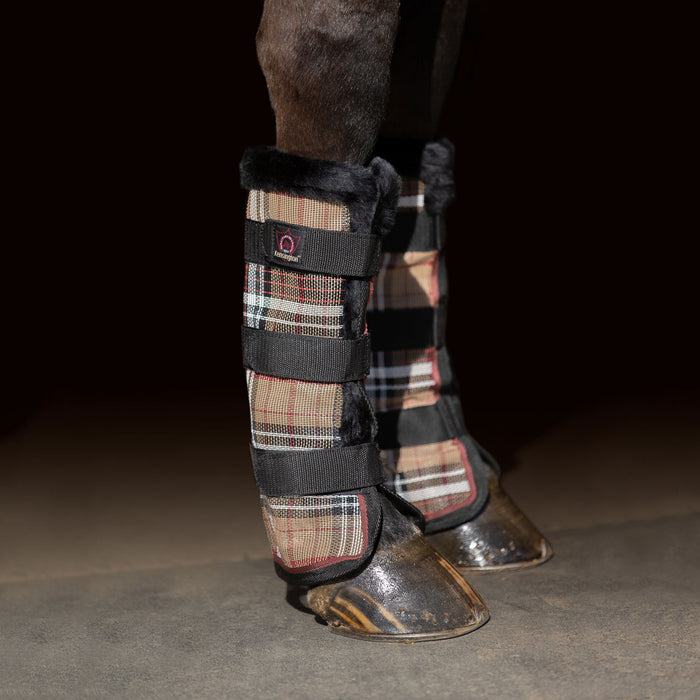 Tan plaid and black color fly boots with fleece trim
