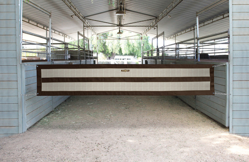 Barn aisle guard in beige and brown.